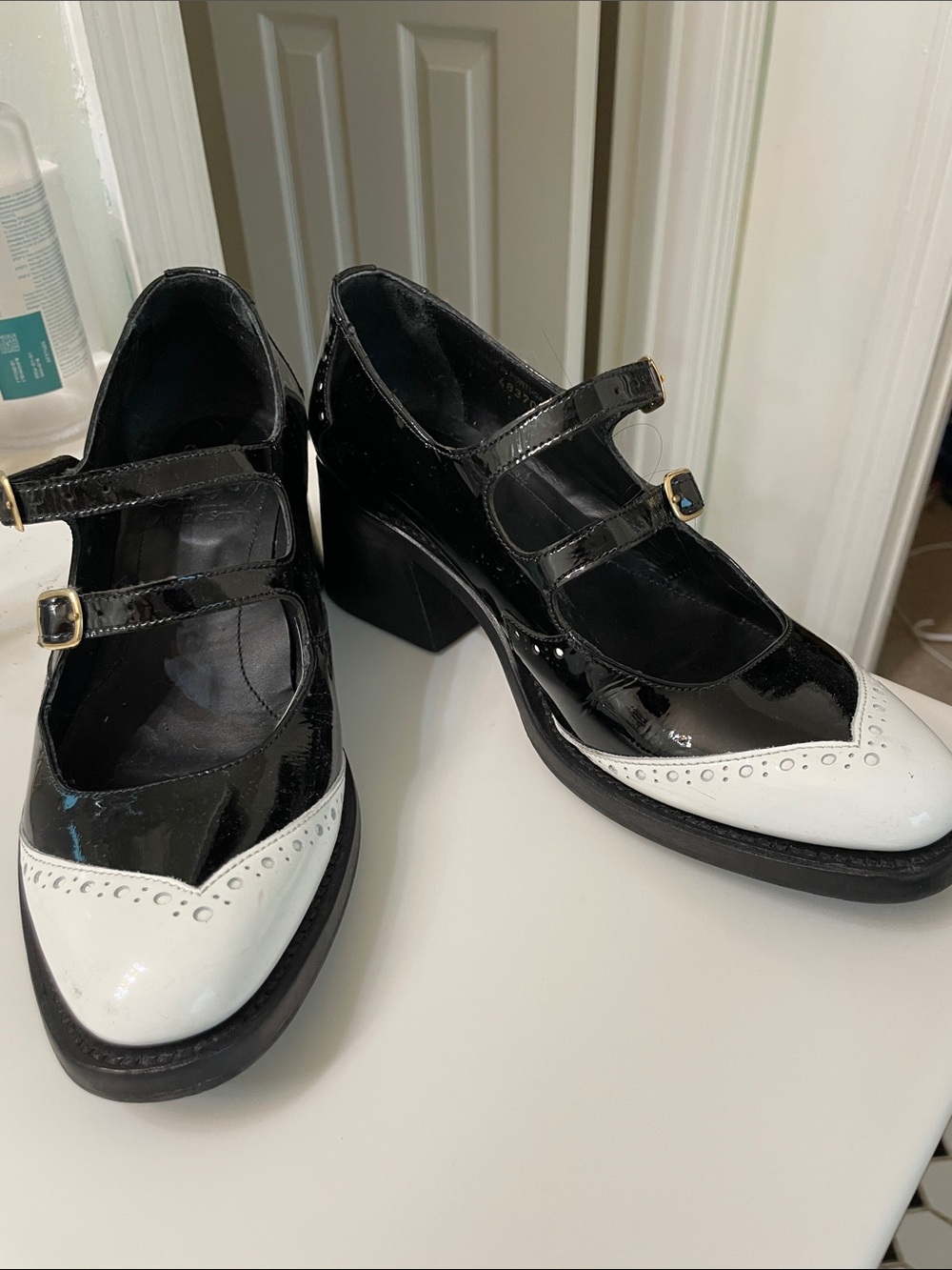 The Office of Angela Scott Black and White Patent Mary Jane Block Heel Pumps
